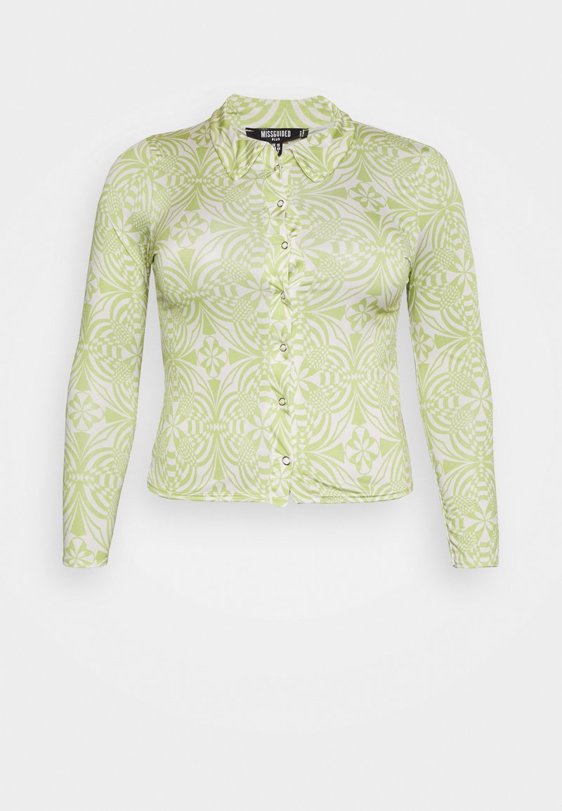 Camisa de botão de manga longa em verde claro e branco com um padrão floral. Apresenta um colarinho e um tecido texturizado.