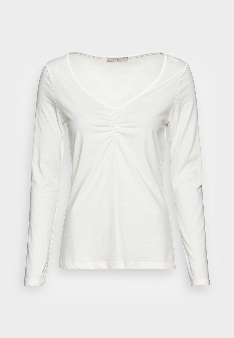 Witte lange mouwen shirt met een V-hals en geplooid detail aan de voorkant. Gemaakt van zachte, lichte stof met een gladde textuur.