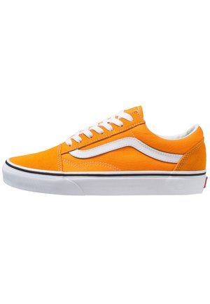 Orange canvas sneaker with white rubber sole and laces. Features a white side stripe and black accent along the sole. Classic low-top design.