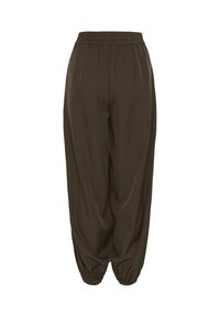 Pantalon marron ample avec taille élastique et poignets élastiques froncés, conçu pour un port décontracté ou confortable.