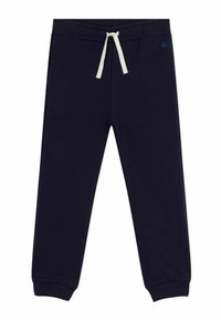 Pantalons de survêtement bleu marine en tissu doux, avec une taille élastique dotée d'un cordon de serrage crème et des poignets fuselés. Deux poches latérales incluses.