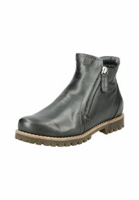 Bottine en cuir noir avec fermeture éclair sur le côté, finition texturée, bout rond et semelle en caoutchouc robuste avec des crampons profonds.