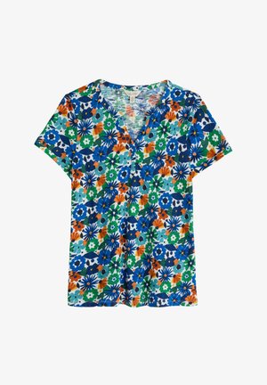 Īsām piedurknēm florāls tops ar zilu, zaļu, oranžu un baltu rakstu uz gaiša fona, veidots ar V-veida kakla izgriezumu.