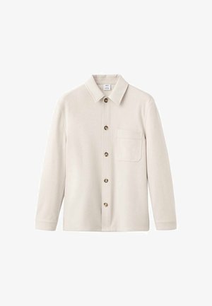 Lichtbeige shirt met een klassieke kraag, vijf knopen aan de voorzijde en een borstzak; gemaakt van zacht, gestructureerd stof.