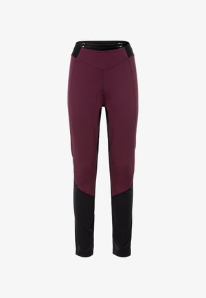 Sötét burgundi színű leggings fekete kiegészítőkkel. Magas derékkal, testhez simuló szabással és megerősített varrással a fenék részén.