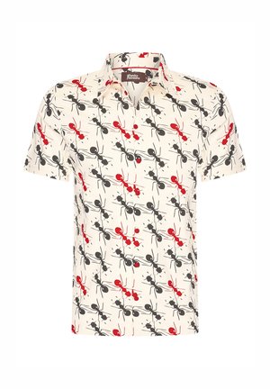 Short-sleeve polo shirt in light cream fabric with a playful pattern of red and black ants, featuring a button-up front and a classic collar.