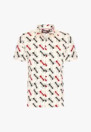 Short-sleeve polo shirt in light cream fabric with a playful pattern of red and black ants, featuring a button-up front and a classic collar.