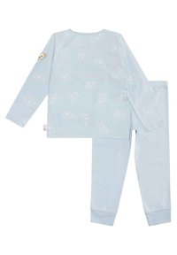 Světle modrý bavlněný pyžamový set s dlouhým rukávem a kalhotami. Design zahrnuje vzory bílých slonů a malou zvířecí nášivku na rukávu.