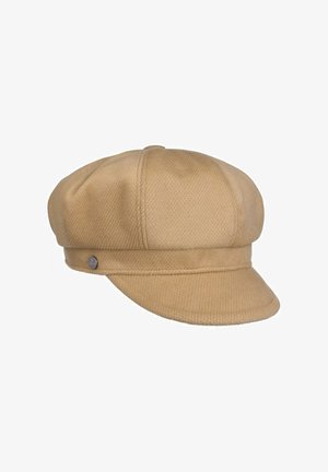 Beige textured newsboy cap with a short curved brim and a small round metal logo on the left side band.