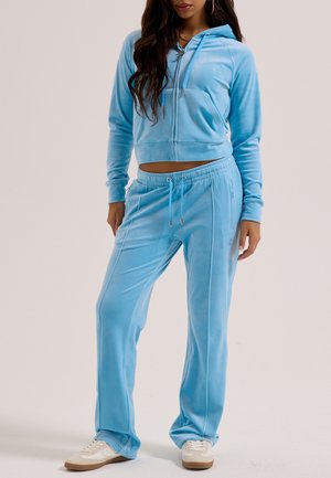 Juicy Couture, TINA OUTLINE TRACKPANT - JOGGER - Pantaloni sportivi - light blue