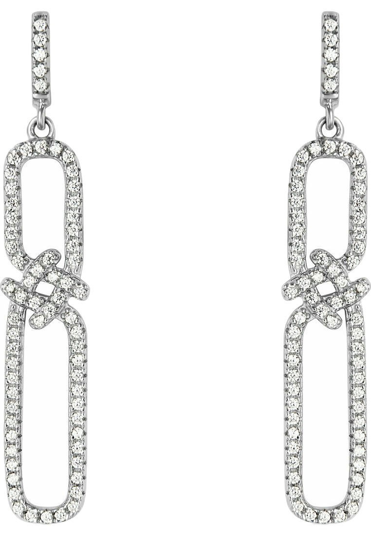 Orecchini pendenti in tonalità argento con forme rettangolari interconnesse, decorate con pietre trasparenti e scintillanti lungo i bordi.