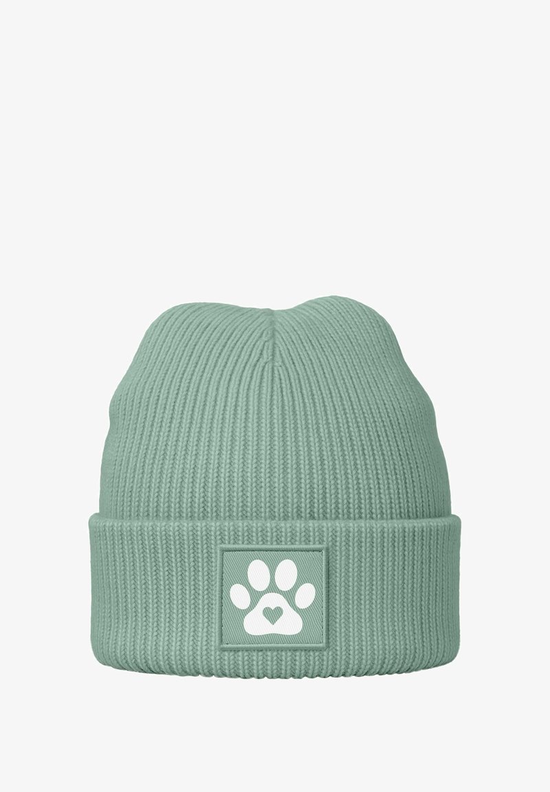 Mint green ribbed beanie featuring a folded cuff and patch with a white paw print and heart design. Soft texture and stretchy fit.