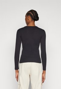 Champion ICONS LONG SLEEVE  - Majica z dolgimi rokavi - black
