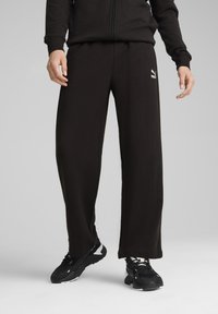 Puma RELAXED TRACK PANTS - Tepláky - black black