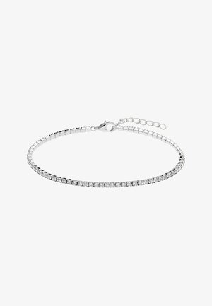 Zilveren armband met een rij heldere, ronde kristallen, gezet in een flexibele ketting met een karabijnsluiting en een verstelbare verlengkettinkje.