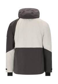 Veste imperméable en gris et crème, dotée d'une capuche, de poignets élastiques et d'un design de color-block diagonal unique au dos.