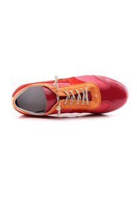 Red and orange athletic shoe with perforated material and a textured upper, featuring beige laces and a rounded toe design.
