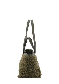 Green leather handbag with curly textured fabric exterior, trapezoidal shape, double shoulder straps, and no visible hardware details.