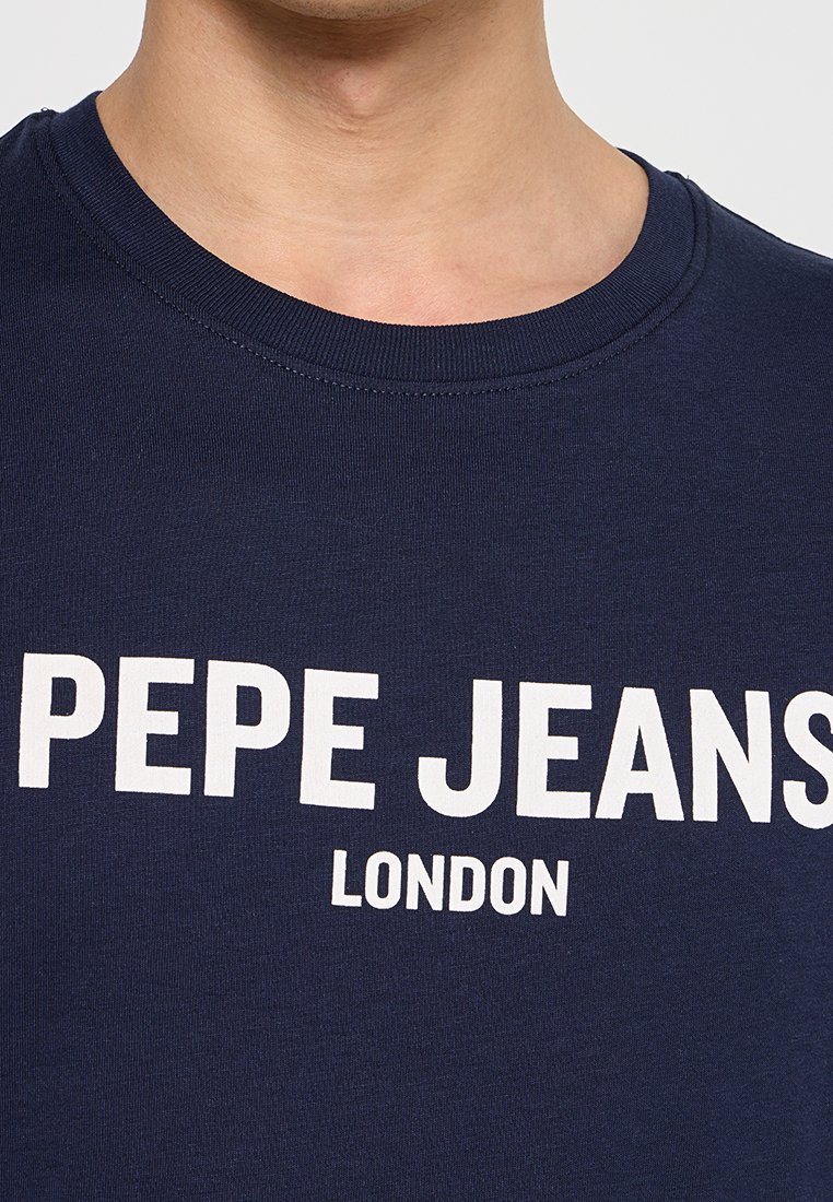 Camiseta de algodón azul marino con un estampado gráfico blanco de "PEPE JEANS" y "LONDRES" en letras mayúsculas y en negrita.