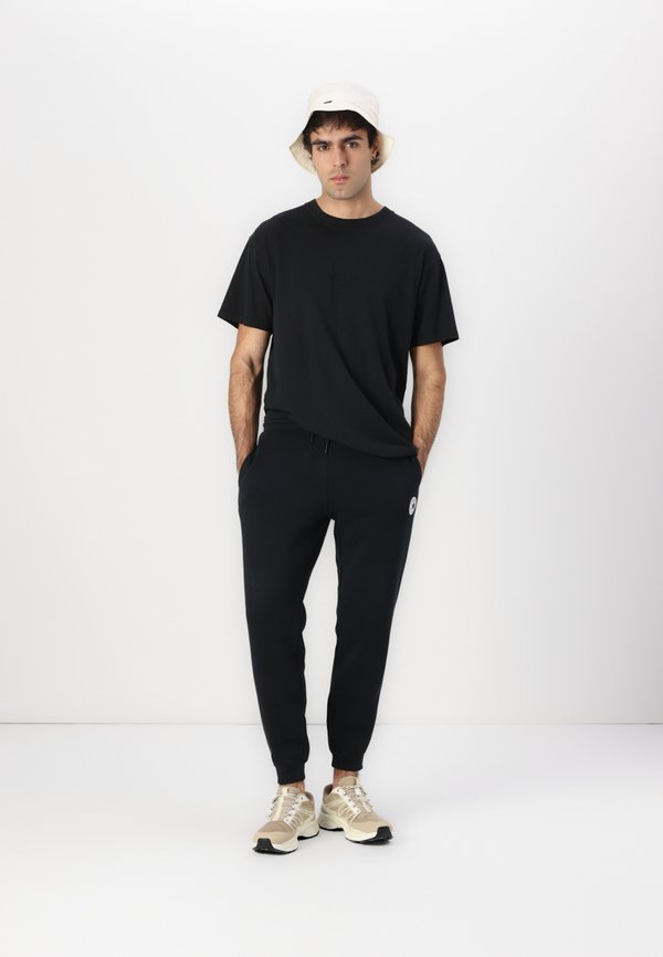 STANDARD FIT CHUCK TAYLOR PATCH PANTS UNISEX - Tracksuit bottoms4