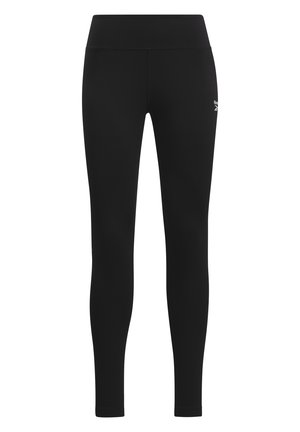 Leggings noirs en matériau extensible avec une texture lisse, dotés d'une large ceinture et d'un petit logo près de la hanche.