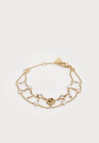 Gouden armband met verweven kettingen, parels en heldere edelstenen. Centraal medaillon met een logo. Sluiting met een kreeftsluiting.