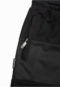 UNFAIR ATHLETICS CENTER COURT  - Kratke hlače - black