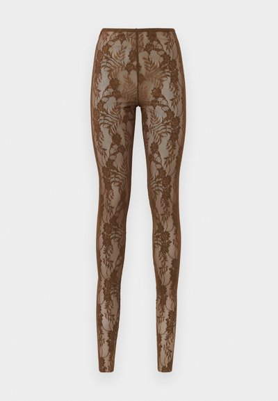 Brune blonde leggins med blomsterdesign, med en gjennomsiktig tekstur og tettsittende design. Høy midje for en tettsittende passform, glatte sømmer.