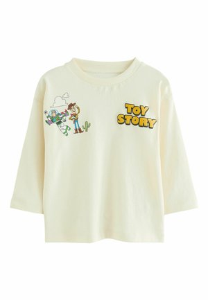 Krémová košeľa s dlhým rukávom s postavami z Toy Story Buzz Lightyear a Woody, s kaktusom a textom "Toy Story" na prednej strane.