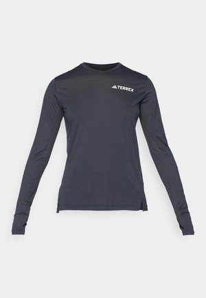 Long-sleeve navy performance shirt with a crew neckline, featuring a white "Terrex" logo and textured mesh side panels.