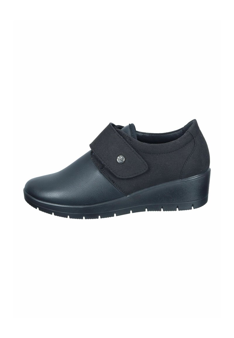 Black wedge shoes with a smooth leather toe and a soft fabric upper. Features a Velcro strap and a textured sole for grip.