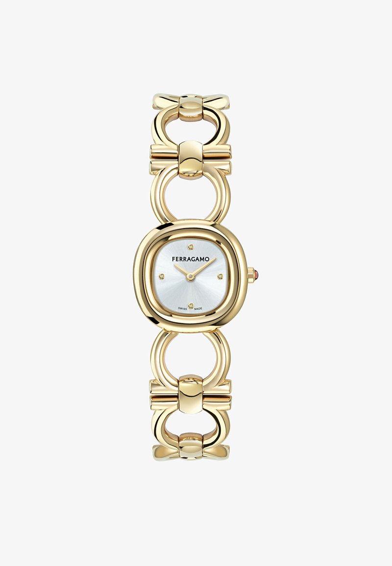 Auksinė apyrankė su kvadratiniu ciferblatu ir baltu paviršiumi, kuri turi penkis valandų žymeklius ir grandinėlės stiliaus apyrankę su lankų akcentais.