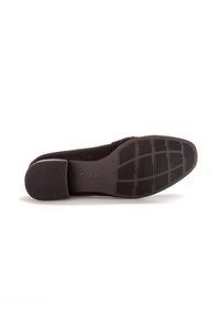 Black suede shoe with a rounded toe and textured rubber outsole featuring horizontal and vertical grooves. Gabor logo on the side.