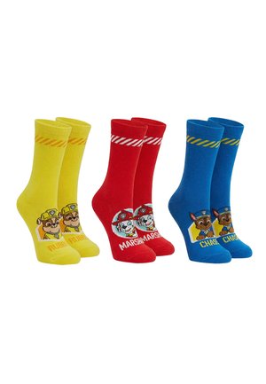 Trois paires de chaussettes pour enfants en jaune, rouge et bleu, chacune présentant les personnages de Paw Patrol : Rubble, Marshall et Chase.