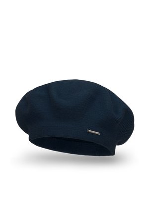 Berretto lavorato a maglia blu navy con una morbida texture, design scivoloso e una piccola accentatura metallica sul lato.