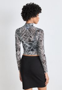 HUGO DASORI - Tops ar garām piedurknēm - open miscellaneous