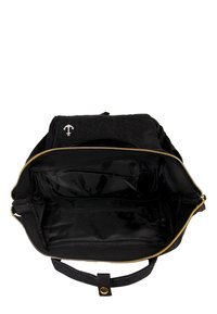 Black fabric bag with a zip closure, featuring a textured surface, inner pockets, and a small white anchor logo on the front.