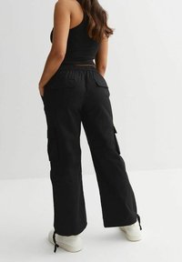 New Look Petite Reisitaskuhousut - black