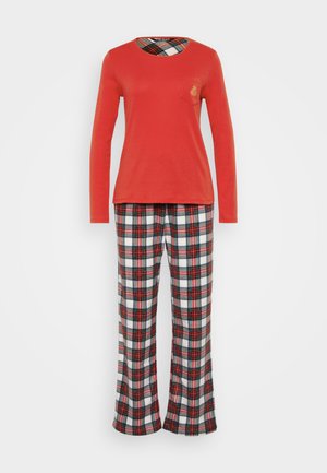 Camisola vermelha de mangas longas com um bolso, combinada com calças de padrão xadrez em vermelho, verde e branco. Tecido macio com um corte descontraído.