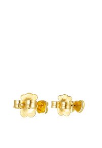 Pendientes de studs en tono dorado con un diseño floral, con pétalos redondeados y un acabado suave. Incluyen cierres en forma de corazón.