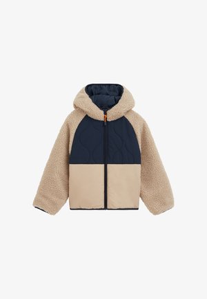 Veste à capuche avec manches en polaire beige et capuche supérieure, poitrine matelassée bleu marine et bas avant beige, fermeture éclair au centre.