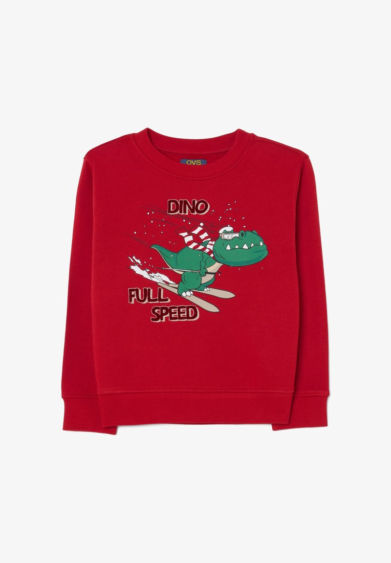 Roter Kinderpullover mit Cartoon-Dinosaurier, der Ski fährt, eine Schutzbrille und einen Schal trägt, mit dem Text "Dino Vollgas" auf der Vorderseite.