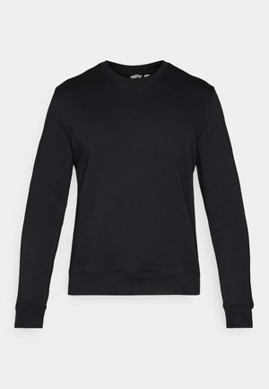 Sort bomull genser med lange ermer, rund hals og ribbede mansjetter. Har en enkel, glatt tekstur og en rett kant.