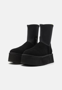 UGG Botines con plataforma - black