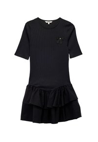 Schwarzes Kleid mit gerippter Textur, kurzen Ärmeln und einem Rüschensaum. Verfügt über eine kleine schwarze Schleifenakzentuierung mit einem Juwel-Detail.