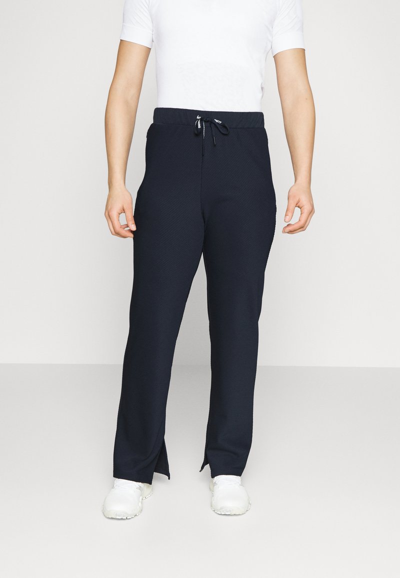 J.LINDEBERG Sports IMAN PANT Trousers navy/dark blue Zalando.ie