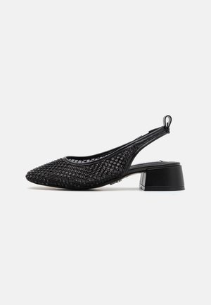 Black slingback shoe with a textured mesh upper, pointed toe, and a low block heel. Features a rear strap for secure fit.