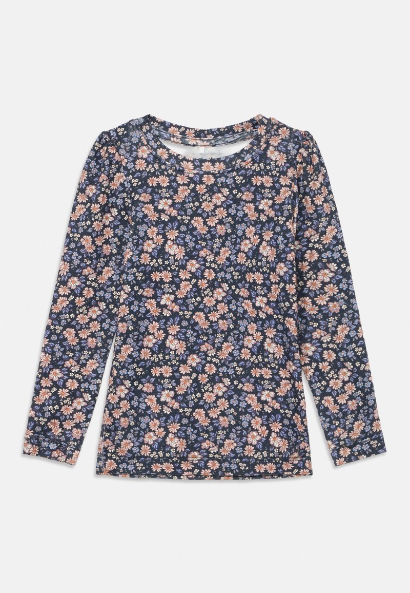 Tumesinine pika varrukaga pluus, millel on lilleline muster, kus on roosa, valge ja sinine lill. Pehme puuvillane materjal ümmarguse kaelusega.