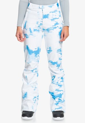 White ski pants with a blue cloud pattern, featuring a fitted waist, wide legs, and zipper cuffs for adjustable fit. Material is smooth and durable.