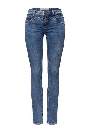 Blue denim skinny jeans with a mid-rise waist, belt loops, front pockets, and subtle stitching details. Smooth texture, classic design.
